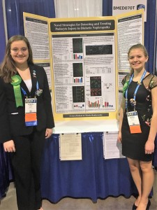 Evelyn Bodoni (left) and Nicole Hankovszky representing their kidney treatment research.